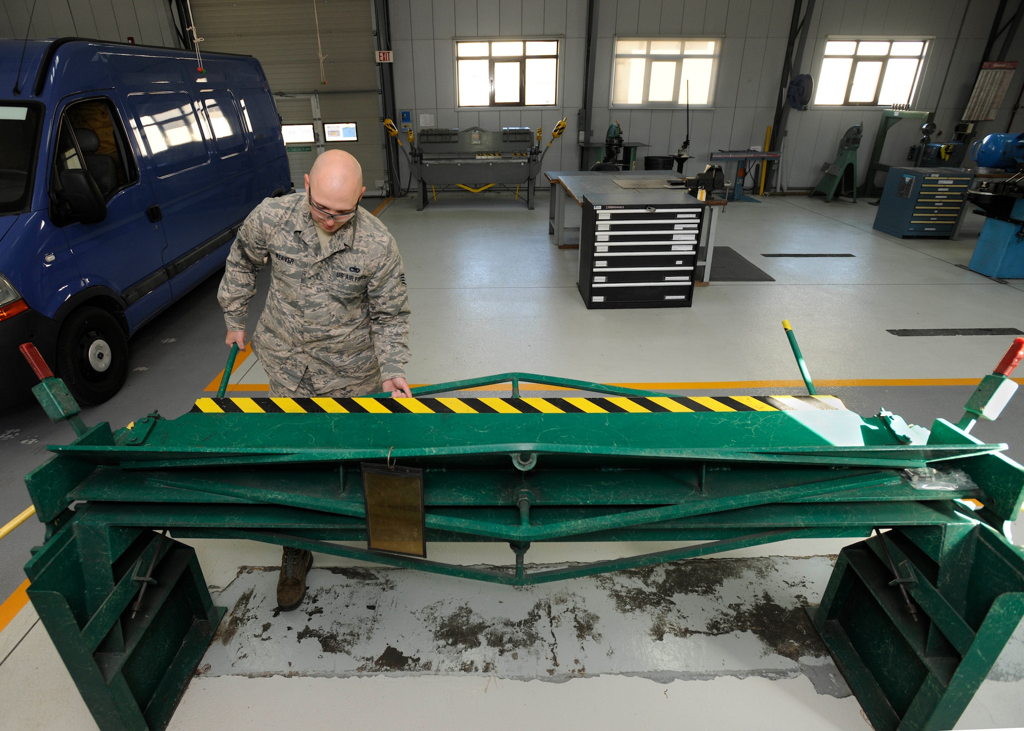 Staff Sgt. Travis Weaver, 39th Maintenance Squadron aircraft structural maintenance craftsman, bends sheet metal April 6, 2015, at Incirlik Air Base, Turkey. The sheet metal shop maintains equipment which includes almost 200 pieces of aerospace ground equipment as well as supporting two separate squadrons and three different missions. (U.S. Air Force photo by Senior Airman Krystal Ardrey/Released)  