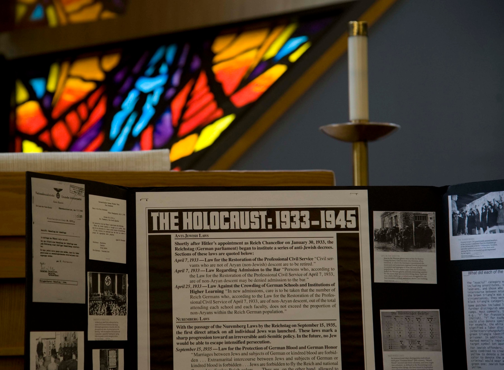 Informational posters about the Holocaust are displayed at the front of the base chapel at Misawa Air Base, Japan, April 13, 2015. Among the information included on the posters were facts, pictures and timelines about anti-Jewish Laws, the Nuremberg Laws and concentration camps. (U.S. Air Force Airman 1st Class Jordyn Fetter/Released)