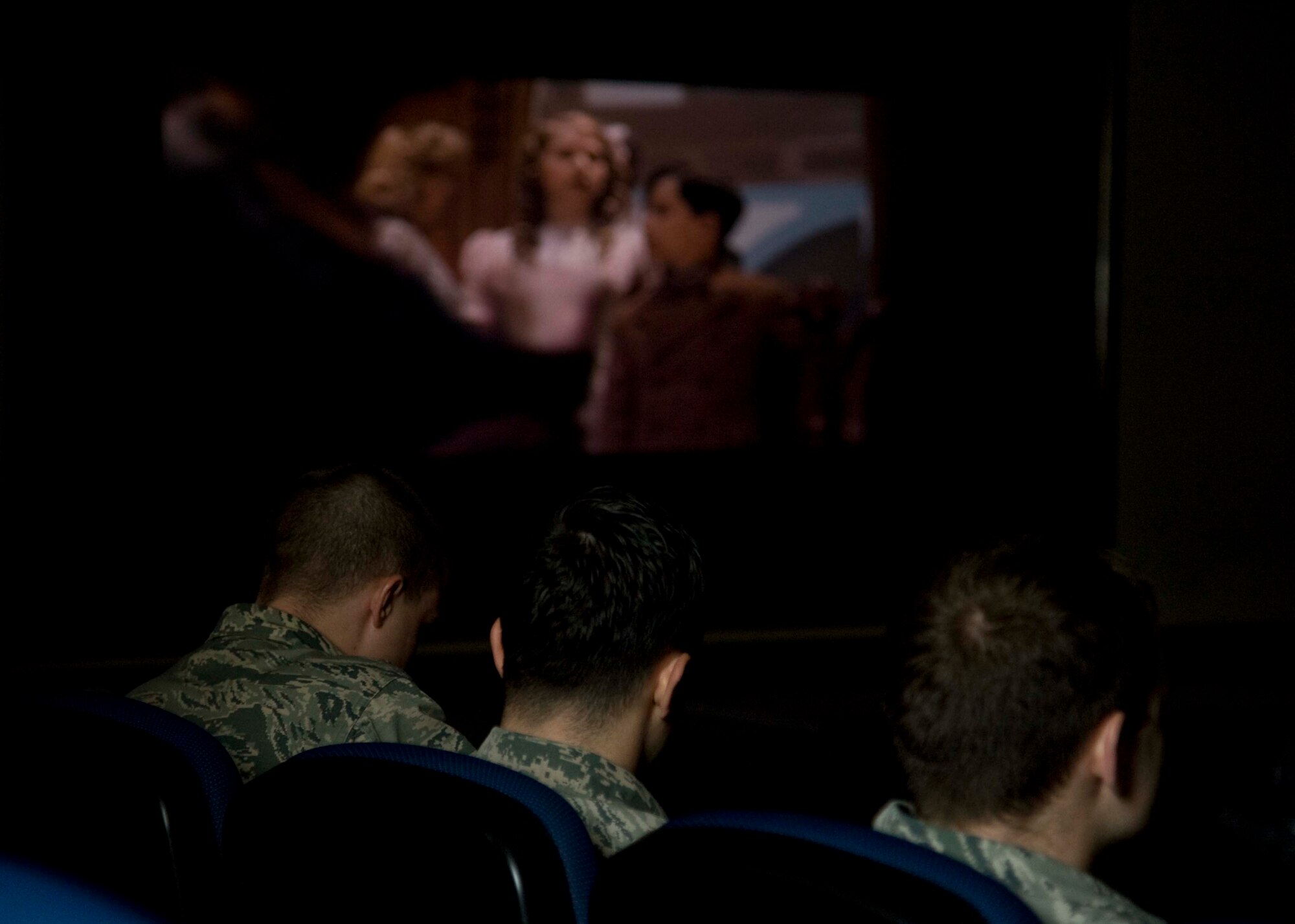 Members of the 35th Fighter Wing gather to watch “The Boy in the Striped Pajamas” at Misawa Air Base, Japan, April 15, 2015. The film was shown to honor the 11 million Holocaust victims during Holocaust Remembrance Week. (U.S. Air Force Airman 1st Class Jordyn Fetter/Released)