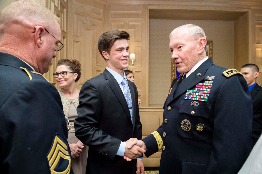 Army Gen. Martin E. Dempsey, chairman of the Joint Chiefs of Staff, meets with National Guard Child of the Year nominee Zachary Alan Parsons during the annual Military Child of the Year awards gala in Arlington, Va., April 16, 2015. 