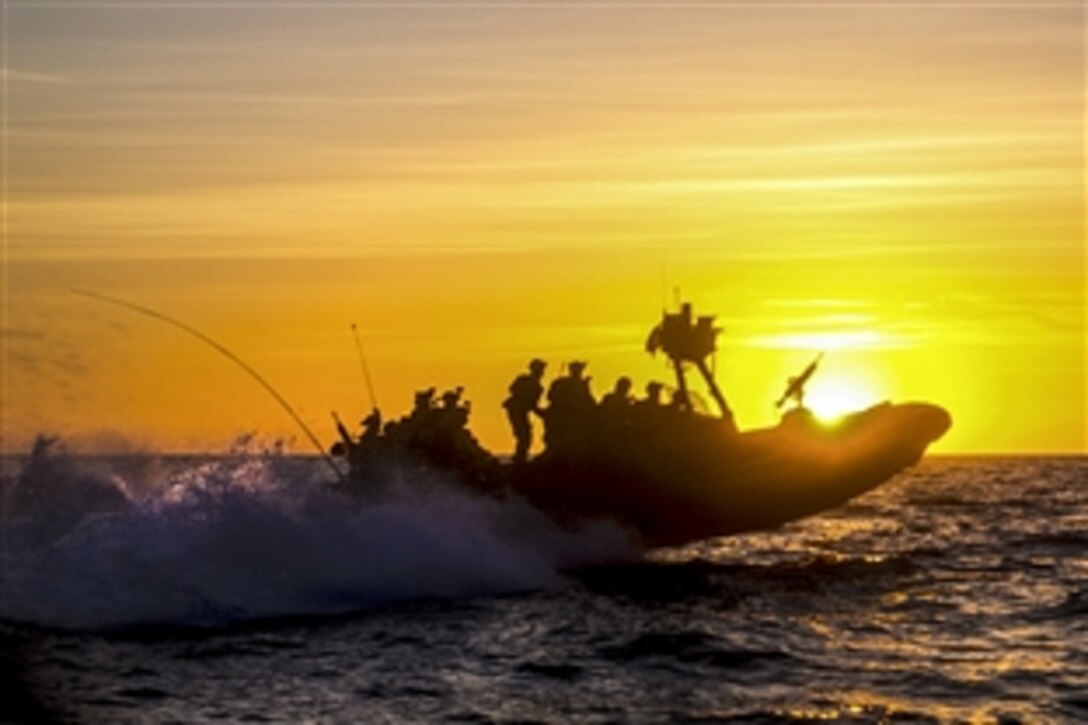Marines ride a rigid-hull inflatable boat to their objective during a certification exercise off the coast of Los Angeles, April 11, 2015. The Marines executed a simulated precision raid at the Port of Los Angeles to test their skills before deploying. The Marines are assigned to the 15th Marine Expeditionary Unit’s Maritime Raid Force.
