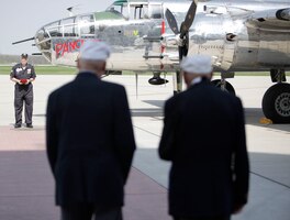 Doolittle Tokyo Raiders Association Sgt. at Arms Brian Anderson prepares to hand the Congressional Gold Medal to Doolittle Raiders Lt. Col. Dick Cole and Staff Sgt. David Thatcher after a ceremonial flight on board the B-25 “Panchito.” (U.S. Air Force photo by Will Haas)