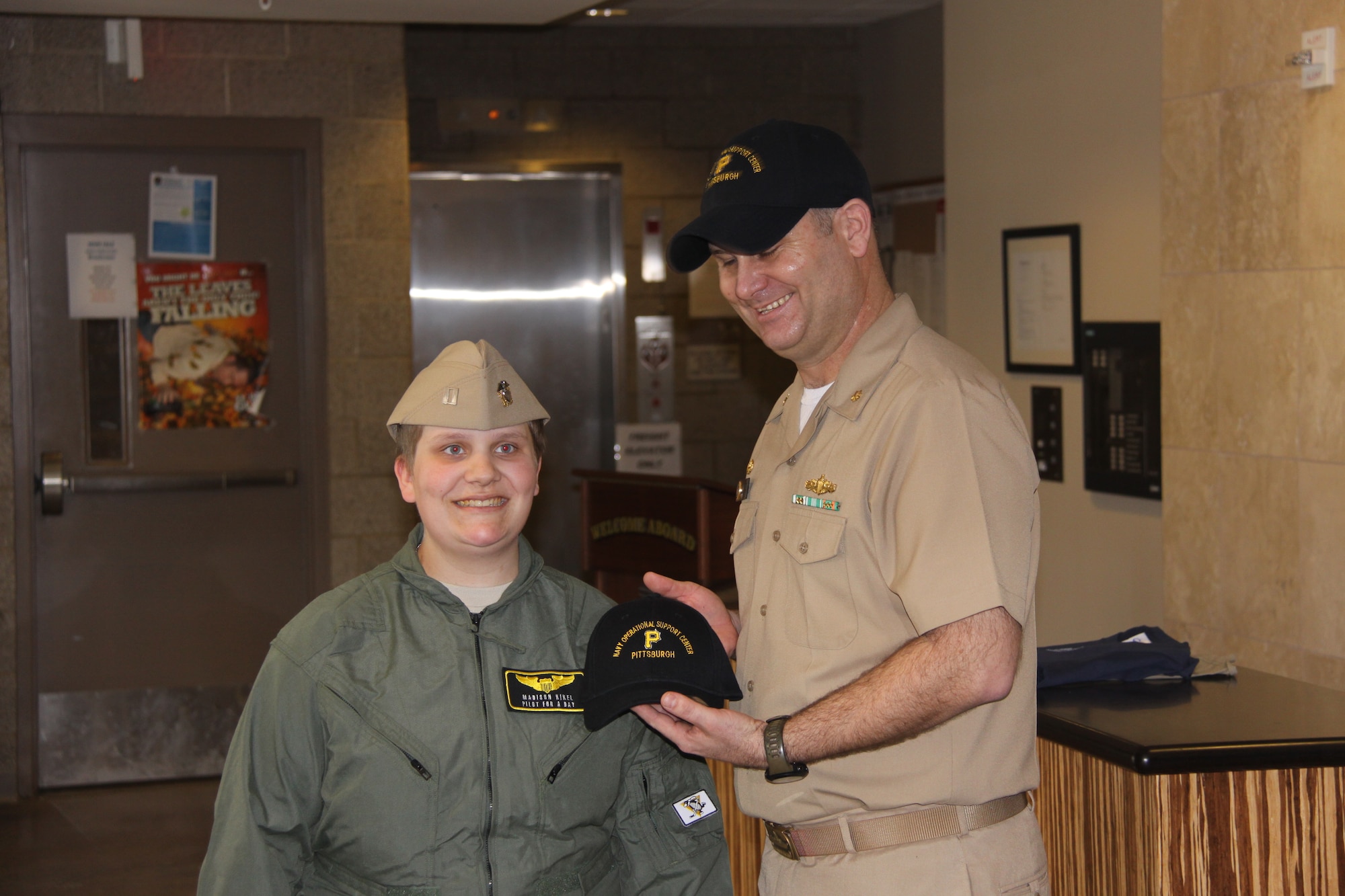 Madison Kikel of Latrobe, Pa., visited the 911th Airlift Wing April 17, 2015. During her visit, she was honored as a "Pilot for a Day" and made an honorary Second Lieutenant and honorary Navy Lieutenant. Kikel was diagnosed with cancer in April of 2014; Kikel and her parents are part of the significant local support for the 911th AW. (U.S. Air Force photo by Master Sgt. Mark Winklosky)