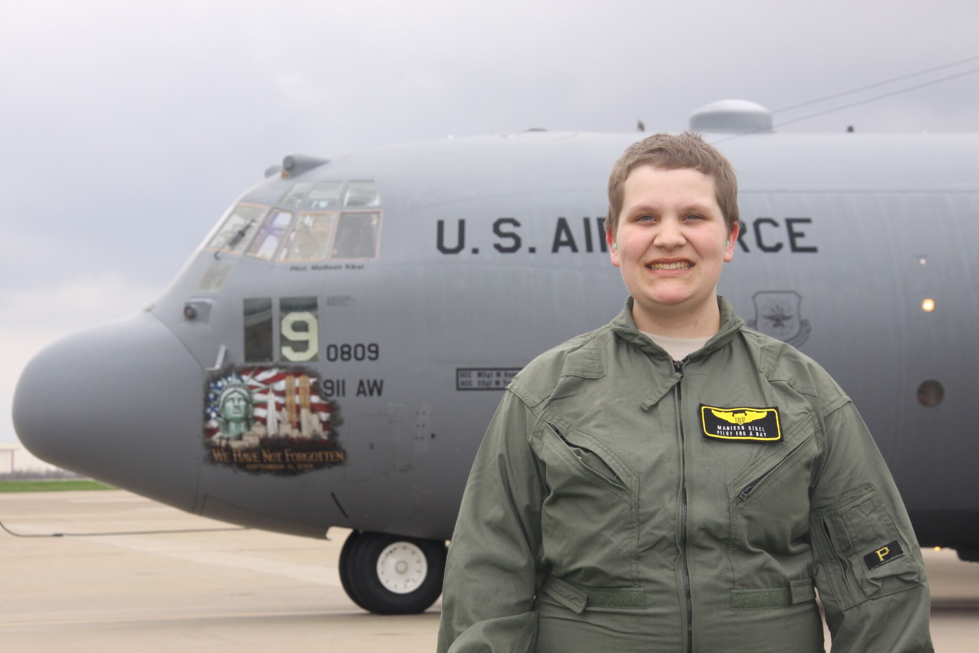 Madison Kikel of Latrobe, Pa., visited the 911th Airlift Wing April 17, 2015. During her visit, she was honored as a "Pilot for a Day" and made an honorary Second Lieutenant and honorary Navy Lieutenant. Kikel was diagnosed with cancer in April of 2014; Kikel and her parents are part of the significant local support for the 911th AW. (U.S. Air Force photo by Master Sgt. Mark Winklosky)
