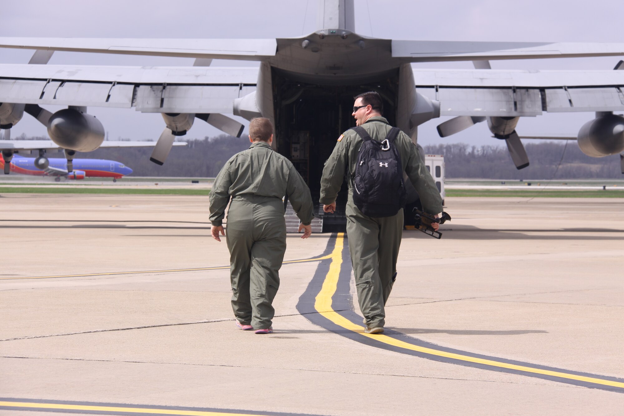 Madison Kikel of Latrobe, Pa., visited the 911th Airlift Wing April 17, 2015. During her visit, she was honored as a "Pilot for a Day" and made an honorary Second Lieutenant and honorary Navy Lieutenant. Kikel was diagnosed with cancer in April of 2014; Kikel and her parents are part of the significant local support for the 911th AW. (U.S. Air Force photo by Master Sgt. Mark Winklosky)