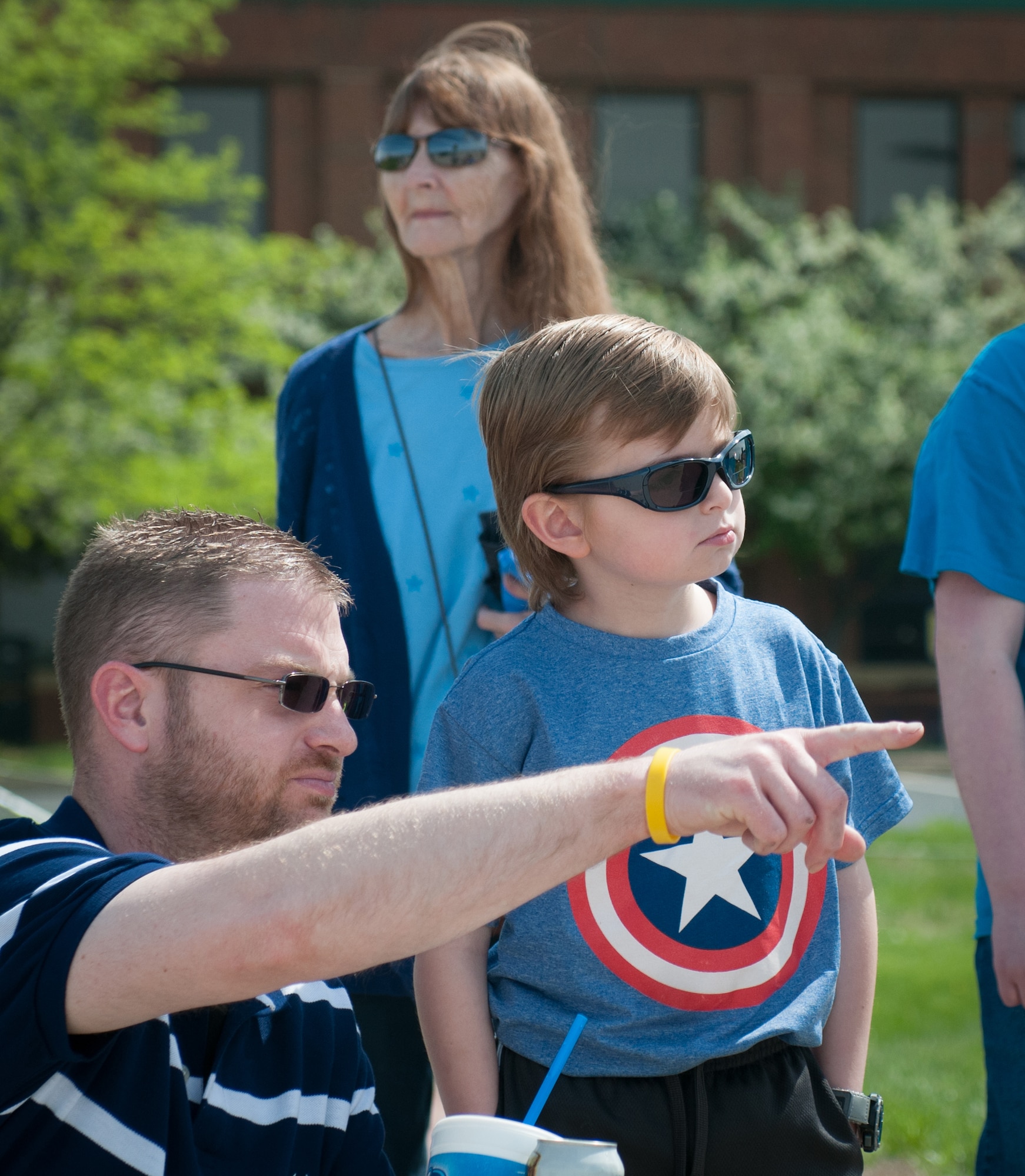 Shane Barr describes a New York Air National Guard C-17 Globemaster II for his son, Dawson, during a visit to the Kentucky Air National Guard Base in Louisville, Ky., April 18, 2015.  Dawson has been battling cancer his entire life and currently has an inoperable brain tumor, making him legally blind in both eyes. (U.S. Air National Guard photo by 2nd Lt. James W. Killen)