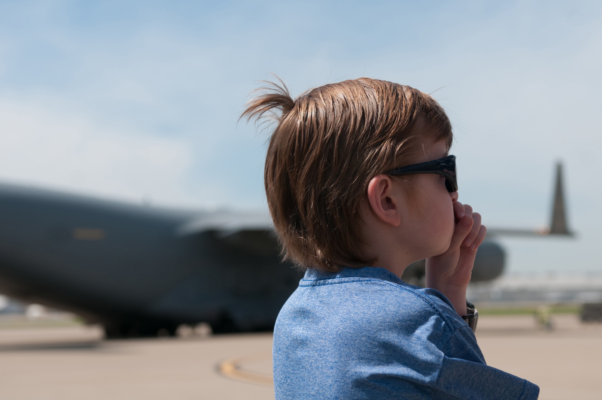 Nine-year-old Dawson Barr and his family visit the Kentucky Air National Guard's 123rd Airlift Wing to view aircraft that will be flown in the annual Thunder Over Louisville Air Show, in Louisville, Ky., April 18, 2015. Dawson has been battling cancer his entire life and currently has an inoperable brain tumor, making him legally blind in both eyes. (U.S. Air National Guard photo by 2nd Lt. James W. Killen)
