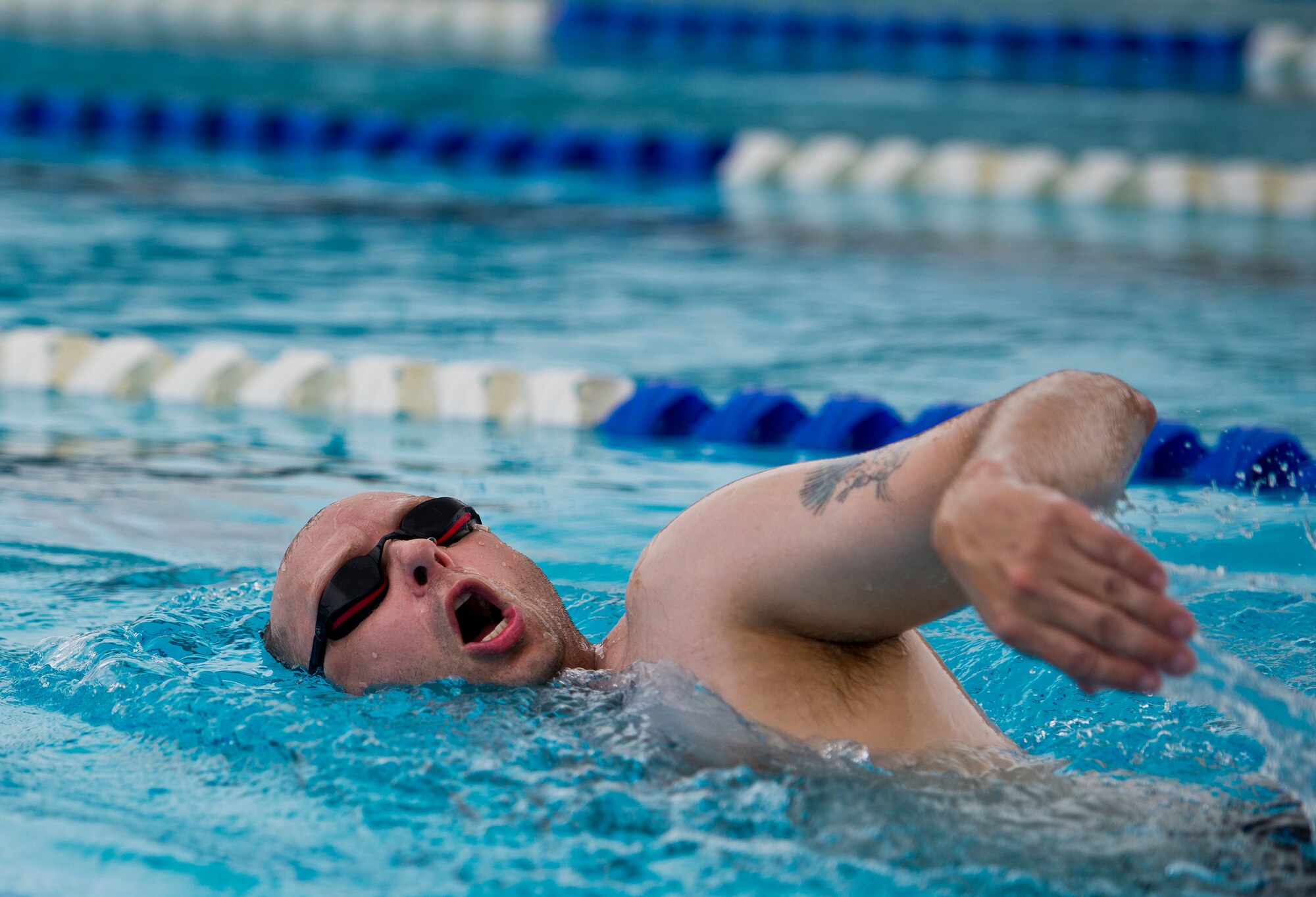 Richard Gustafson, an Air Force Wounded Warrior athlete, swims laps during the first day of the Warrior Games training camp at Eglin Air Force Base, Fla., April 18. The five-day training camp for the Air Force’s athletes serves as their last practice session before the Warrior Games June 19-28. (U.S. Air Force photo/Samuel King Jr.)