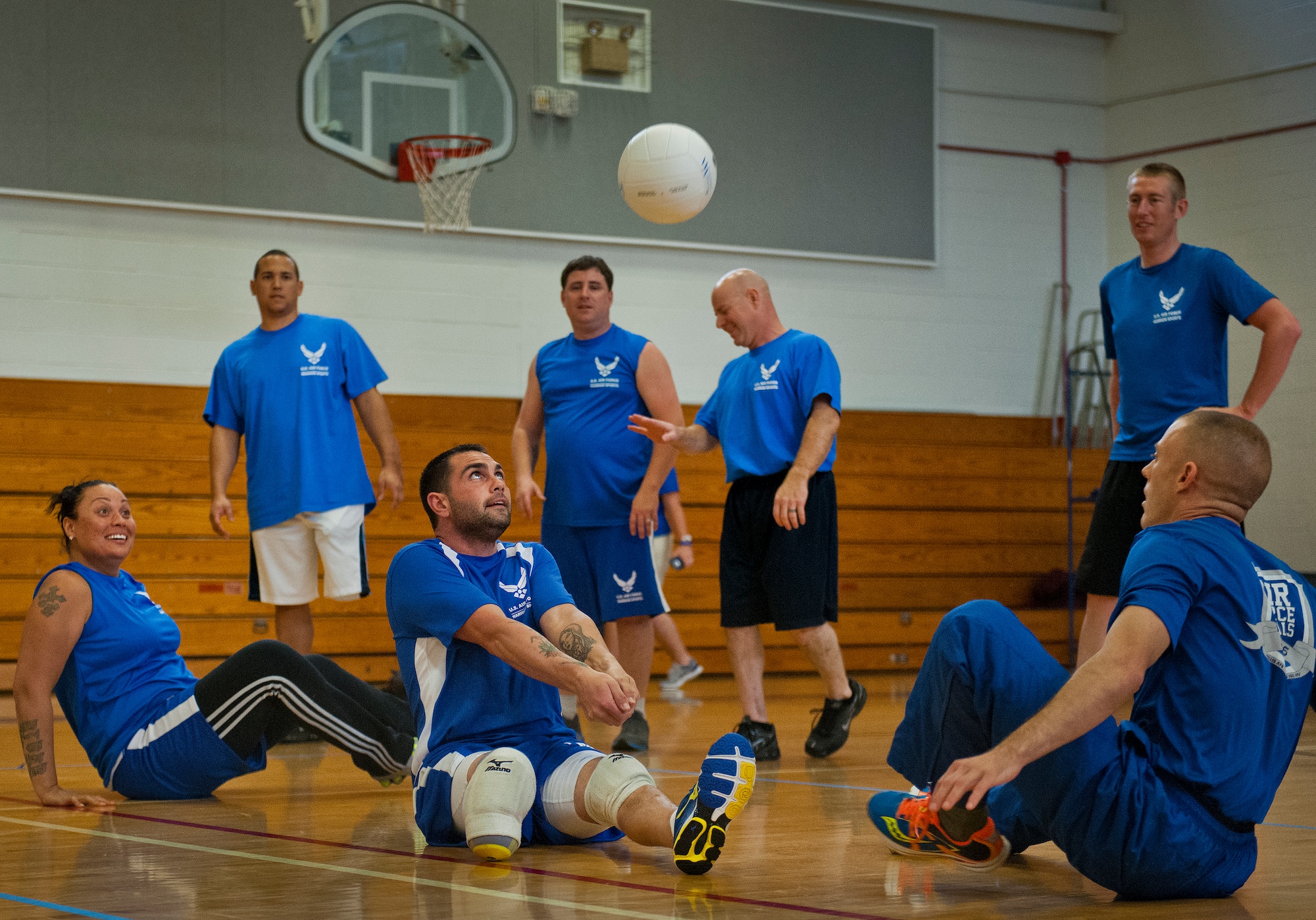 Nick Dadgoster, an Air Force Wounded Warrior athlete, keeps the ball in the air at a sitting volleyball practice during the first day of the Warrior Games training camp at Eglin Air Force Base, Fla., April 18. The five-day training camp for the Air Force’s athletes serves as their last practice session before the Warrior Games June 19-28. (U.S. Air Force photo/Samuel King Jr.)