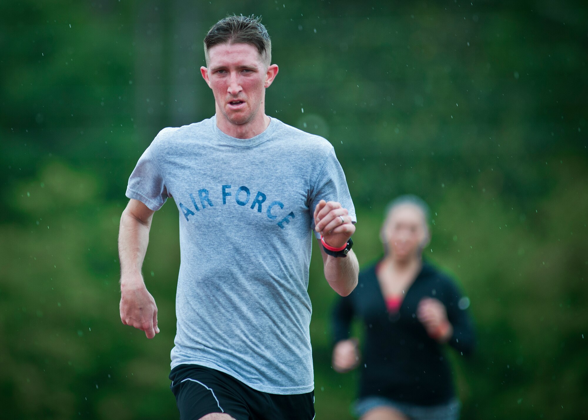 Zachary Burnash, an Air Force an Air Force Wounded Warrior athlete, sprints toward the finish line on the track during the first day of the Warrior Games training camp at Eglin Air Force Base, Fla., April 18. The five-day training camp for the Air Force’s athletes serves as their last practice session before the Warrior Games June 19-28. (U.S. Air Force photo/Samuel King Jr.)