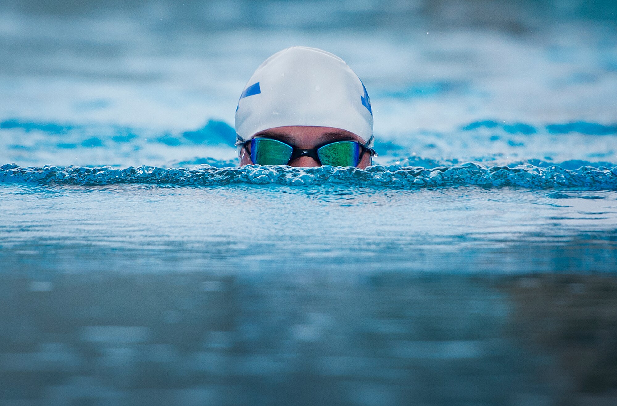 Timothy Babb, an Air Force Wounded Warrior athlete, swims laps during the first day of the Warrior Games training camp at Eglin Air Force Base, Fla., April 18. The five-day training camp for the Air Force’s athletes serves as their last practice session before the Warrior Games June 19-28. (U.S. Air Force photo/Samuel King Jr.)