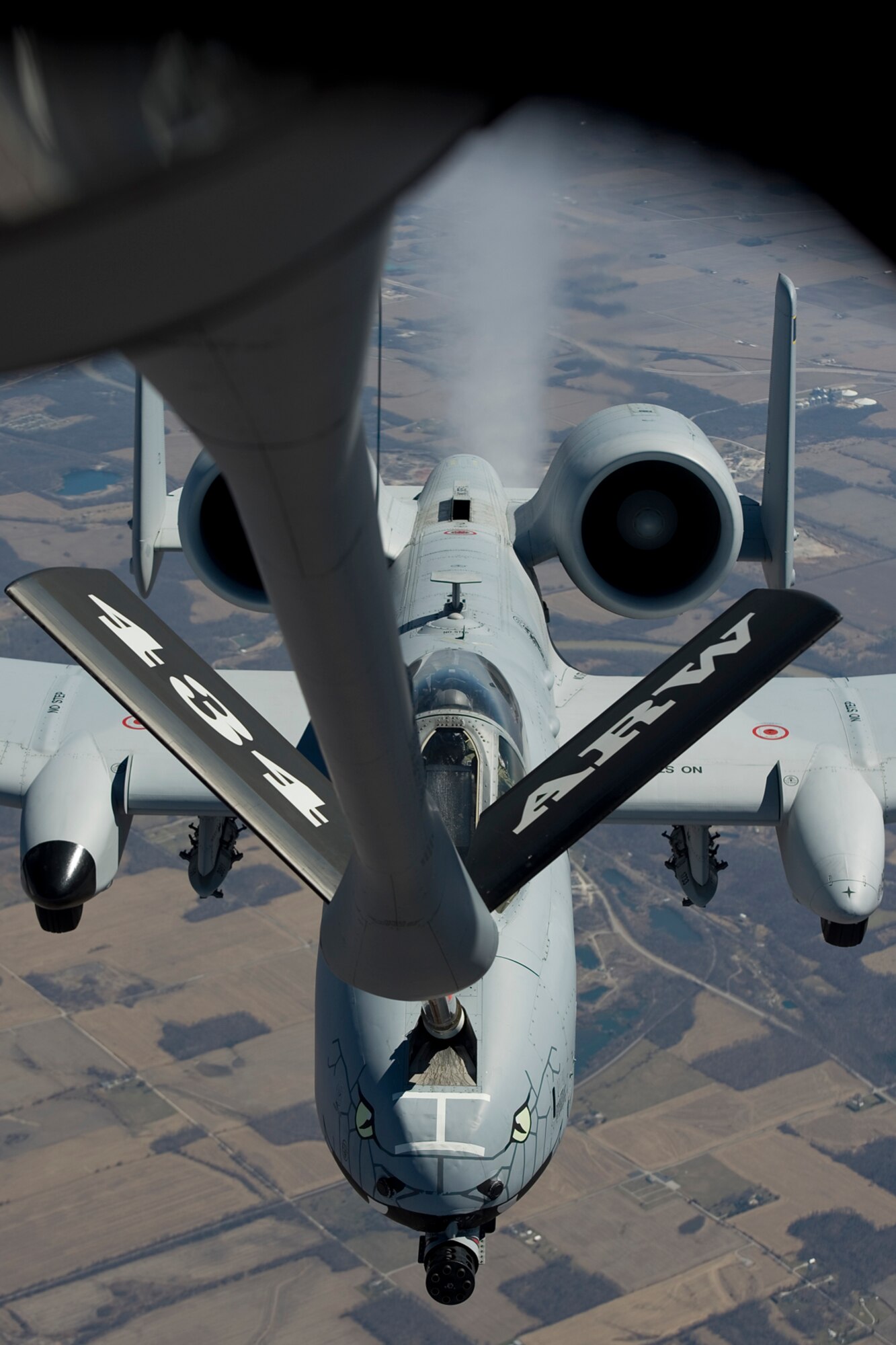 An A-10 Thunderbolt II aircraft from the Air National Guard's 122nd Fighter Wing in Fort Wayne, Ind., refuels from a KC-135R Stratotanker aircraft from the Air Force Reserve's 434th Air Refueling Wing at Grissom Air Reserve Base, Ind., during a mission over Indiana April 1, 2015. The refueling was conducted during a cadet orientation flight with University of Notre Dame Air Force ROTC Detachment 225. (U.S. Air Force photo/Tech. Sgt. Benjamin Mota)
