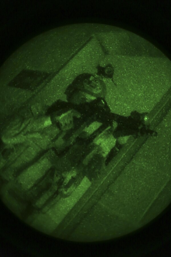 U.S. Marines with Maritime Raid Force, 26th Marine Expeditionary Unit, conduct military operations in urban terrain (MOUT) training at Fort Pickett, Va., April 15, 2015. The training involved role-players, and included room clearing, detainee handling and casualty care. The 26th MEU and its supporting elements are conducting realistic urban training in preparation for deployment to the 5th and 6th Fleet areas of responsibility later this year. (U.S. Marine Corps photo by Cpl. Joshua W. Brown/Released)