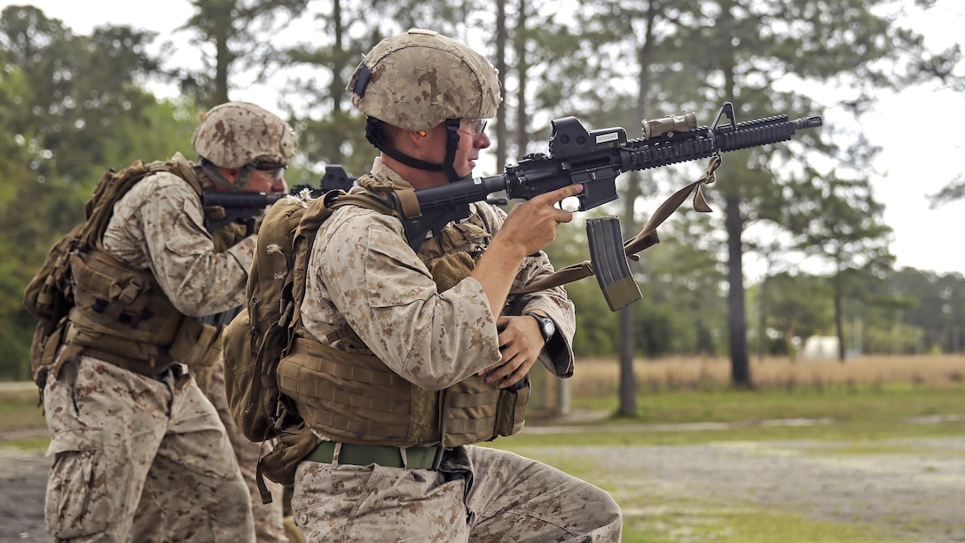 A Marine with 2nd Platoon, 2nd Force Reconnaissance Company, II Marine Expeditionary Force conducts a speed reload during a close-quarters combat tactics course at range K-501A aboard Marine Corps Base Camp Lejeune, N.C., April 14, 2015. Marines built upon training in techniques and tactics in preparation for the 22nd Marine Expeditionary Unit slated to deploy in 2016.