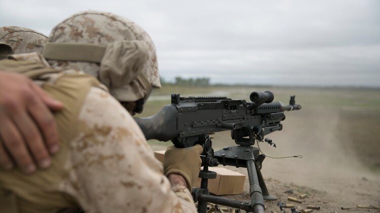 A Marine with 8th Engineer Support Battalion, 2nd Marine Logistics Group, fires an M240 Bravo medium machine gun during a live-fire training exercise at a multipurpose machine gun range at Marine Corps Base Camp Lejeune, North Carolina, April 14, 2015. When on the machine gun range, the Marines were refamiliarized with all facets of weapons handling. 