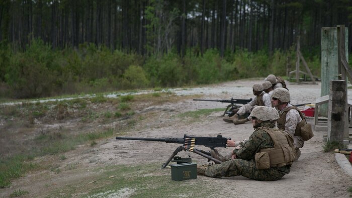 Marines with 8th Engineer Support Battalion, 2nd Marine Logistics Group fire live rounds from an M2 .50-caliber heavy machine gun during a live-fire training exercise at a multipurpose machine gun range at Marine Corps Base Camp Lejeune, North Carolina, April 14, 2015. They were taught the basic weapons conditions, practiced multiple safety techniques, and demonstrated to the instructors how to break down the weapons and how to keep the weapon systems properly maintained before and after use. 
