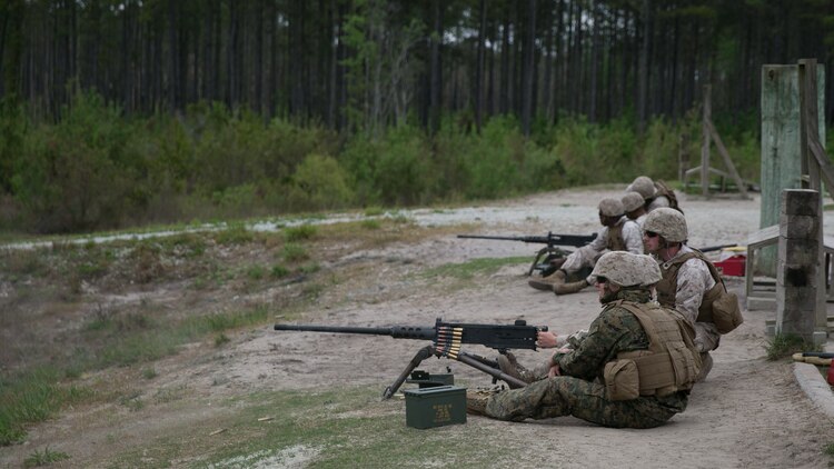 Marines with 8th Engineer Support Battalion, 2nd Marine Logistics Group fire live rounds from an M2 .50-caliber heavy machine gun during a live-fire training exercise at a multipurpose machine gun range at Marine Corps Base Camp Lejeune, North Carolina, April 14, 2015. They were taught the basic weapons conditions, practiced multiple safety techniques, and demonstrated to the instructors how to break down the weapons and how to keep the weapon systems properly maintained before and after use. 