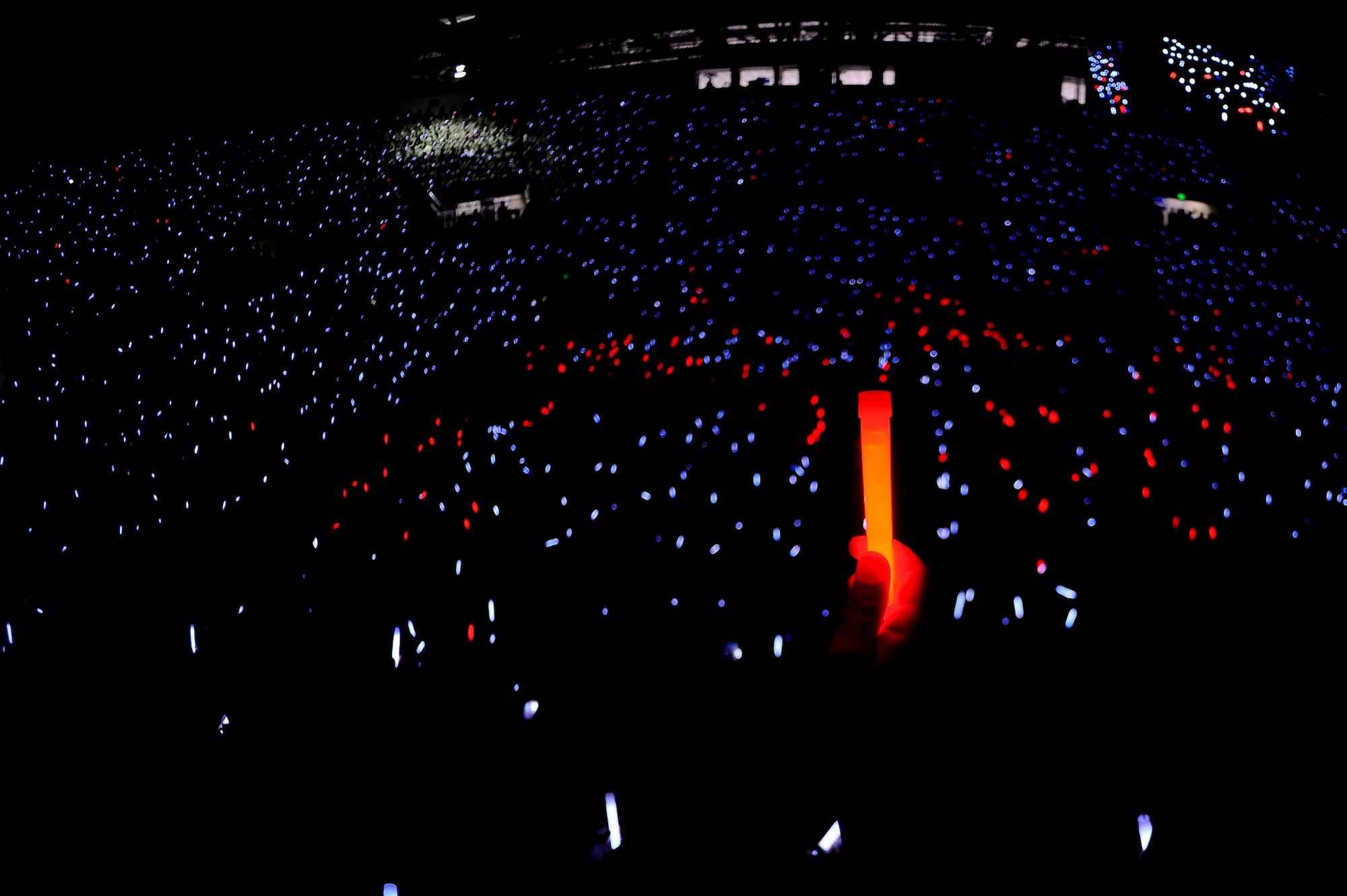 Cadets hold up glow sticks in the U.S. Air Force Academy’s Clune Arena, Colorado, April 16, 2015, to represent the number of sexual assault victims at the Academy during the last 10 years, during the Academy's second annual Take Back the Night event. At the event, cadets heard messages from Secretary of the Air Force Deborah Lee James and Katie Koestner, the first survivor to speak out nationally about date rape. (U.S. Air Force photo/Master Sgt. Kenneth Bellard)  