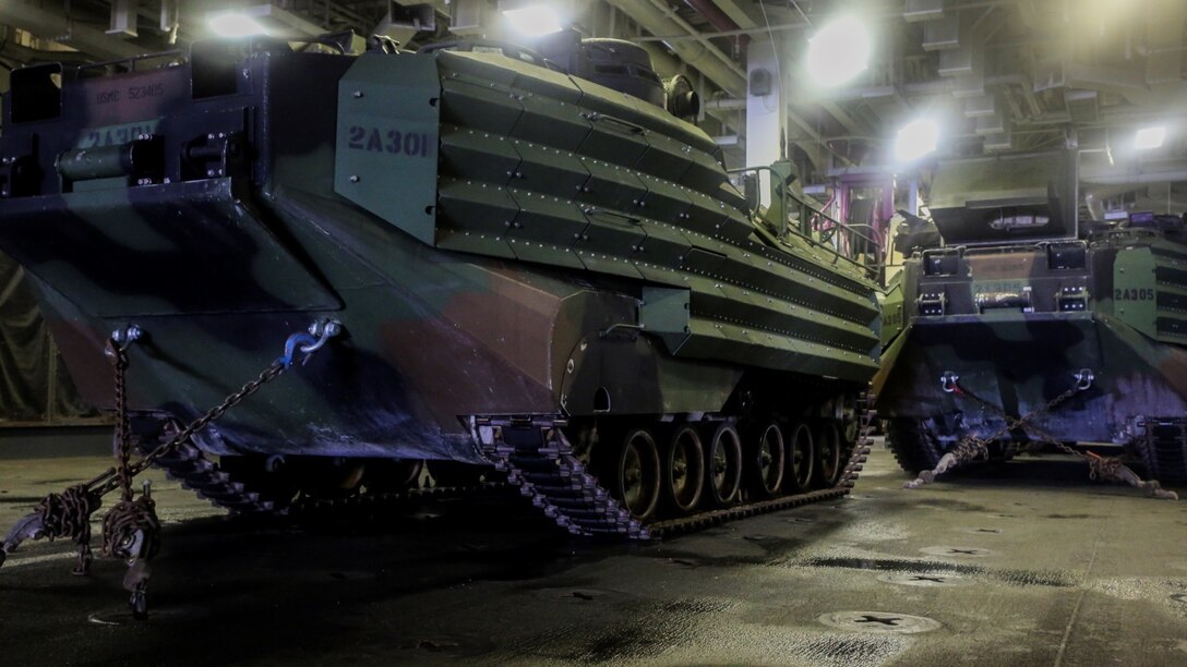 Amphibious assault vehicles belonging to 3rd Platoon, Alpha Company, 2nd Assault Amphibian Battalion are secured to the well-deck of the multipurpose amphibious assault ship USS Kearsarge (LHD-3) April 12, 2015. The platoon used their amphibious assault vehicles to transport Marines from 1st Battalion, 6th Marine Regiment in support of a ship-to-shore exercise off the coast of Onslow Beach, Camp Lejeune, N.C. 