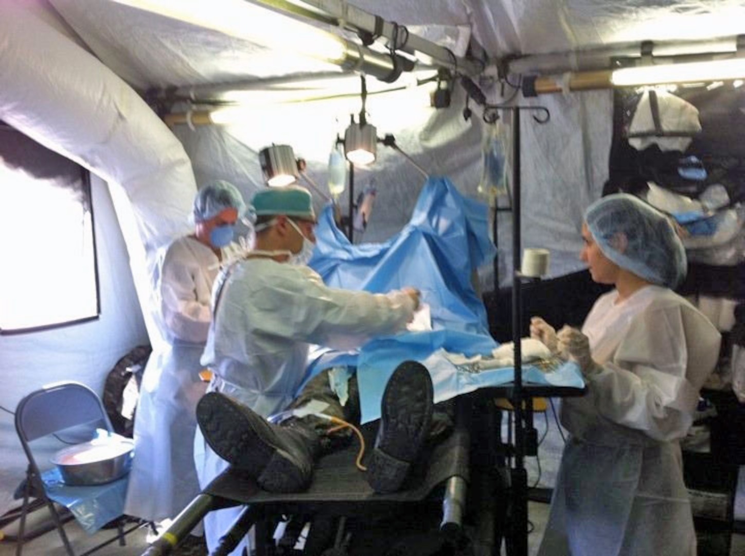 A team of Armenian surgeons simulates a field surgery in an expeditionary medical support system during a three-day exercise near Zarh, Armenia, Sept. 3, 2010. It was the first time the Armenian military had deployed EMEDS to the field.