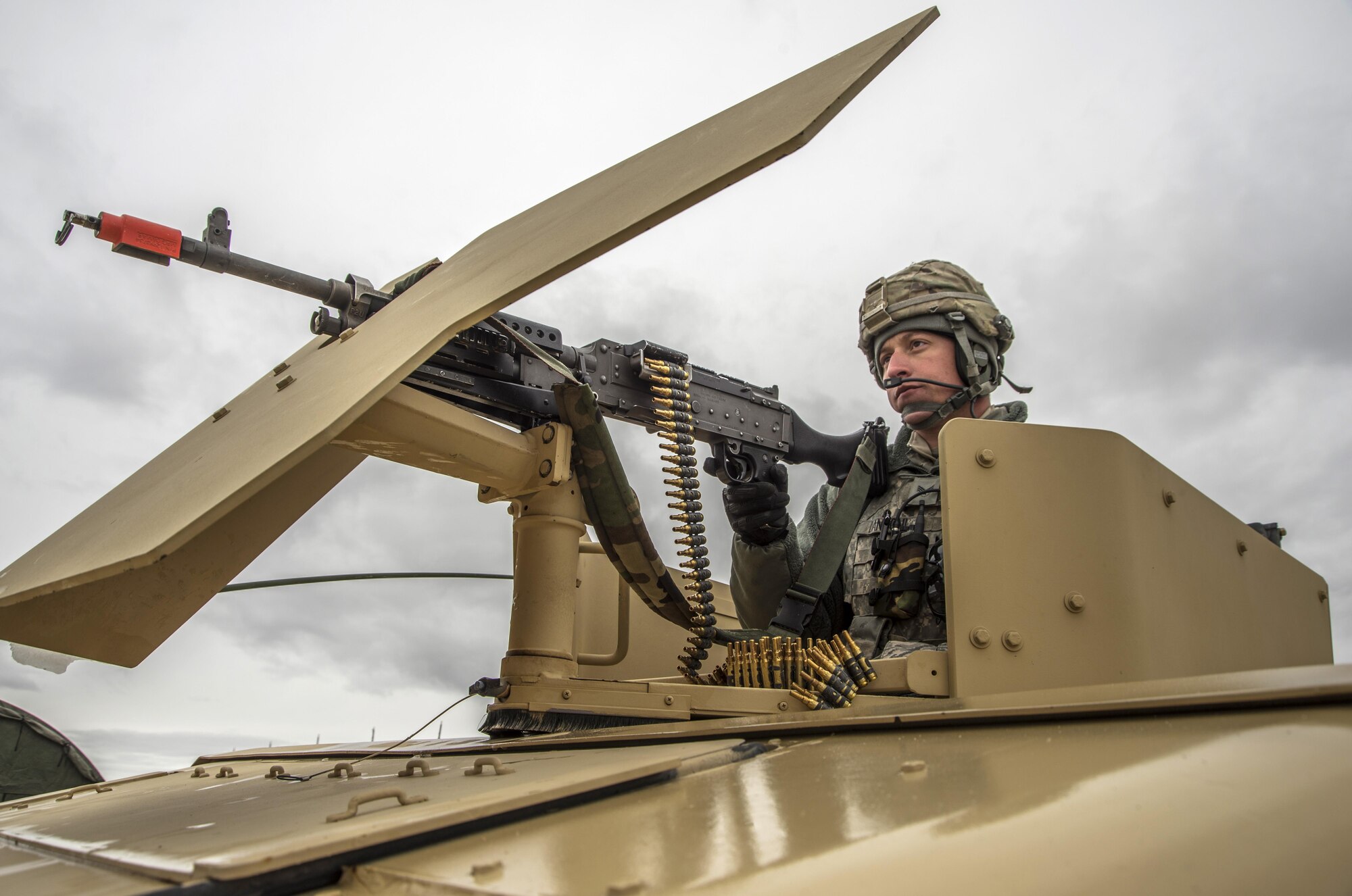 Senior Airman John Dantoni, a 366th Security Forces Squadron defender, protects the rear of a convoy during Gunfighter Flag 15-2 at Saylor Creek Range, Idaho, April 14, 2015. The exercise is designed to increase combat proficiency by creating realistic scenarios for joint service members. (U.S. Air Force photo/Staff Sgt. Roy Lynch III)