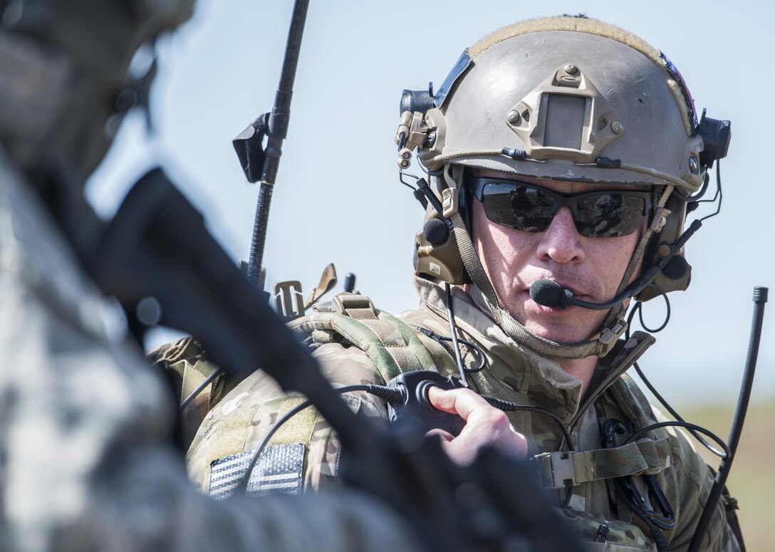 Master Sgt. Mark Andrews, 124th Air Support Operation Squadron tactical air control party, calls in close air support during Gunfighter Flag 15-2 at Saylor Creek Range, Idaho, April 15, 2015. The exercise consisted of realistic tactical scenarios to train joint service members for deployed missions. (U.S. Air Force photo/Staff Sgt. Roy Lynch III) 
