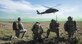 An Army UH-60 Blackhawk lands to pick up 366th Security Forces Squadron and 124th Air Support Operation Squadron members during Gunfighter Flag 15-2 at Saylor Creek Range, Idaho, April 15, 2015. The exercise allowed joint service members a chance to execute realistic operation scenarios in an environment similar to Southwest Asia. (U.S. Air Force photo/Staff Sgt. Roy Lynch III)
