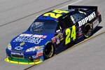 Jeff Gordon races the No. 24 National Guard-sponsored Military Intelligence NASCAR racecar Sept. 11, at Richmond International Raceway, Va.