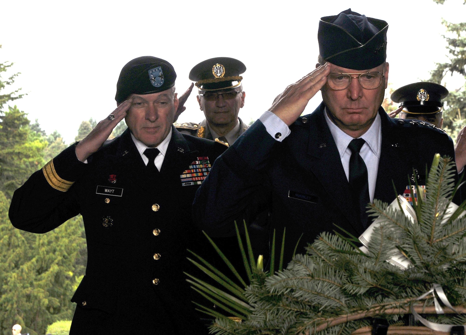 Air Force Gen. Craig McKinley, right, the chief of the National Guard
Bureau, and Army Maj. Gen. Gregory Wayt, left, the adjutant general of the
Ohio National Guard, lay a wreath at the Monument to the Unknown Hero on
Mount Avala in Serbia on Sept. 11, 2010. "It was especially poignant today,
on the anniversary of Sept. 11, 2001, when our nation was attacked, that I
symbolically thank the Serbian military for their support to the United
States in World War I and World War II," McKinley said. Serbia and Ohio are
paired in the National Guard State Partnership Program.