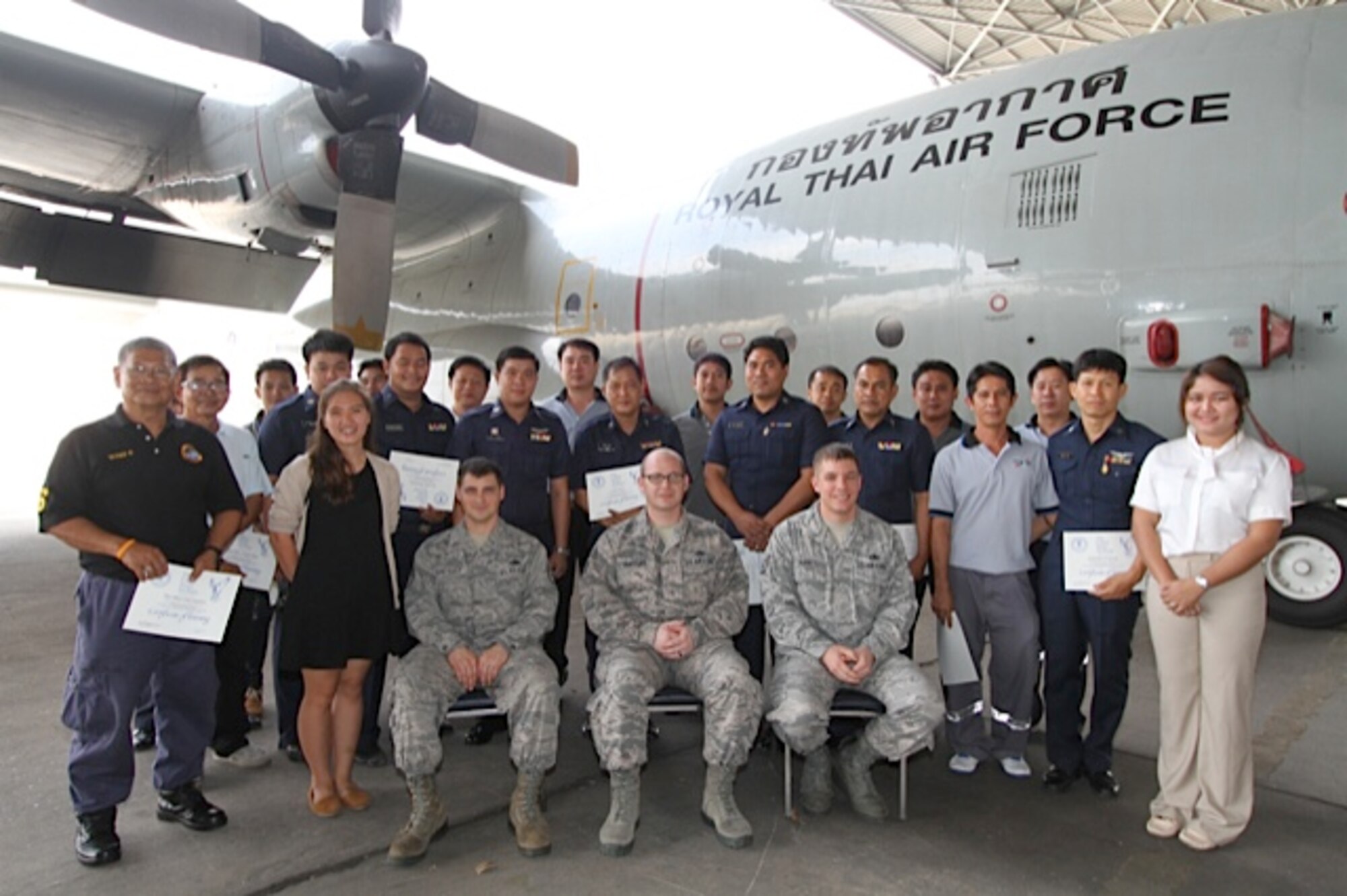 The U.S. Air Force mobile training team presented certificates to twenty RTAF and TAI maintainers in a ceremony on 13 February 2015 in Bangkok, Thailand. A team of three U.S. Air Force C-130 aircraft maintainers from Little Rock Air Force Base’s mobile training team embarked on a two-week training partnership with the Royal Thai Air Force in Bangkok, Thailand. (U.S. Air Force photo by Capt. Steve Massara)    