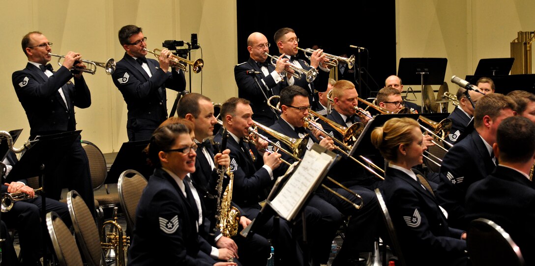 Instrumentalists with the 566th Air Force Band perform at the Illinois Music Educators Association conference opening night in Peoria, Ill., Jan. 28, 2015. The 566 AFB serves in war and peace by preserving national heritage through the power of music at military, recruiting and community relations events. (U.S. Air National Guard photo by Staff Sgt. Lealan Buehrer/Released)