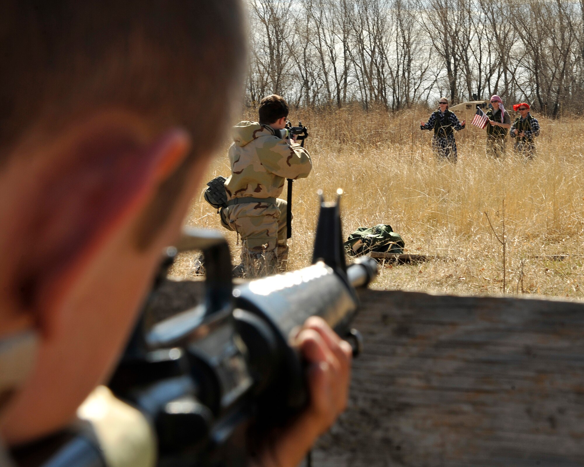 Cadets from the Air Force Reserve Officers’ Training Corps at the University of North Dakota Detachment 610, post up at the entry control point during a field training exercise Apr. 18, 2015, on Grand Forks Air Force Base, N.D. During the exercise, cadets had to accomplish different scenarios such as distinguishing allies from aggressors. (U.S. Air Force photo by Senior Airman Xavier Navarro/Released)