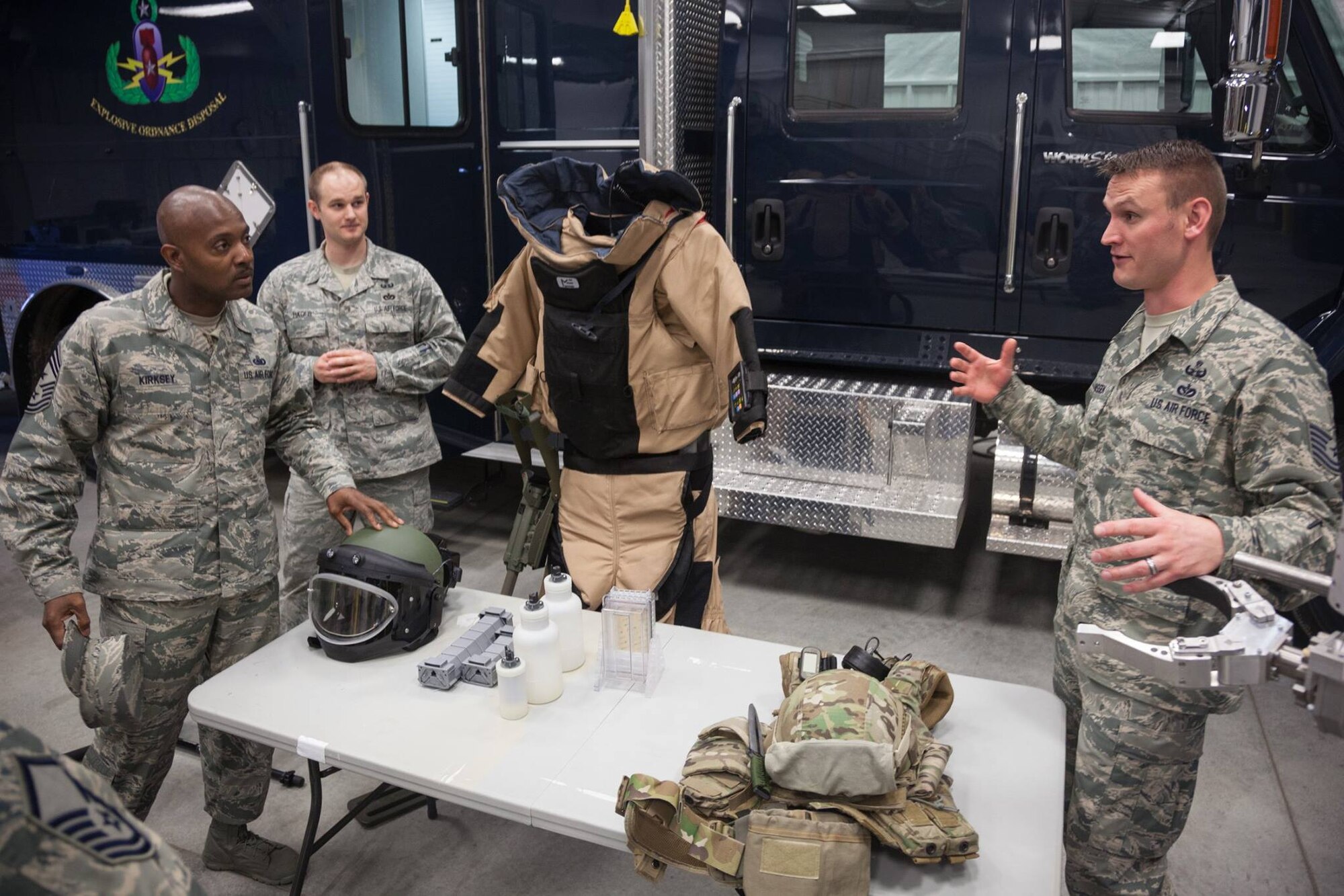 Tech. Sgt. Adam Janssen, 934th Explosive Ordnance Disposal Flight, discusses parts of the EOD mission and equipment with Command Chief Master Sgt. Cameron Kirksey, Air Force Reserve Command command chief, during his visit to the Minneapolis-St. Paul Air Reserve Station, Minn. The visit allowed Chief Kirksey to personally see what the 934th Airlift Wing has to offer, as well as afford an opportunity for reserve and civilian personnel to directly address the Chief regarding benefits and challenges of serving in the Air Force Reserve. (U.S. Air Force photo by Shannon McKay/Released) 