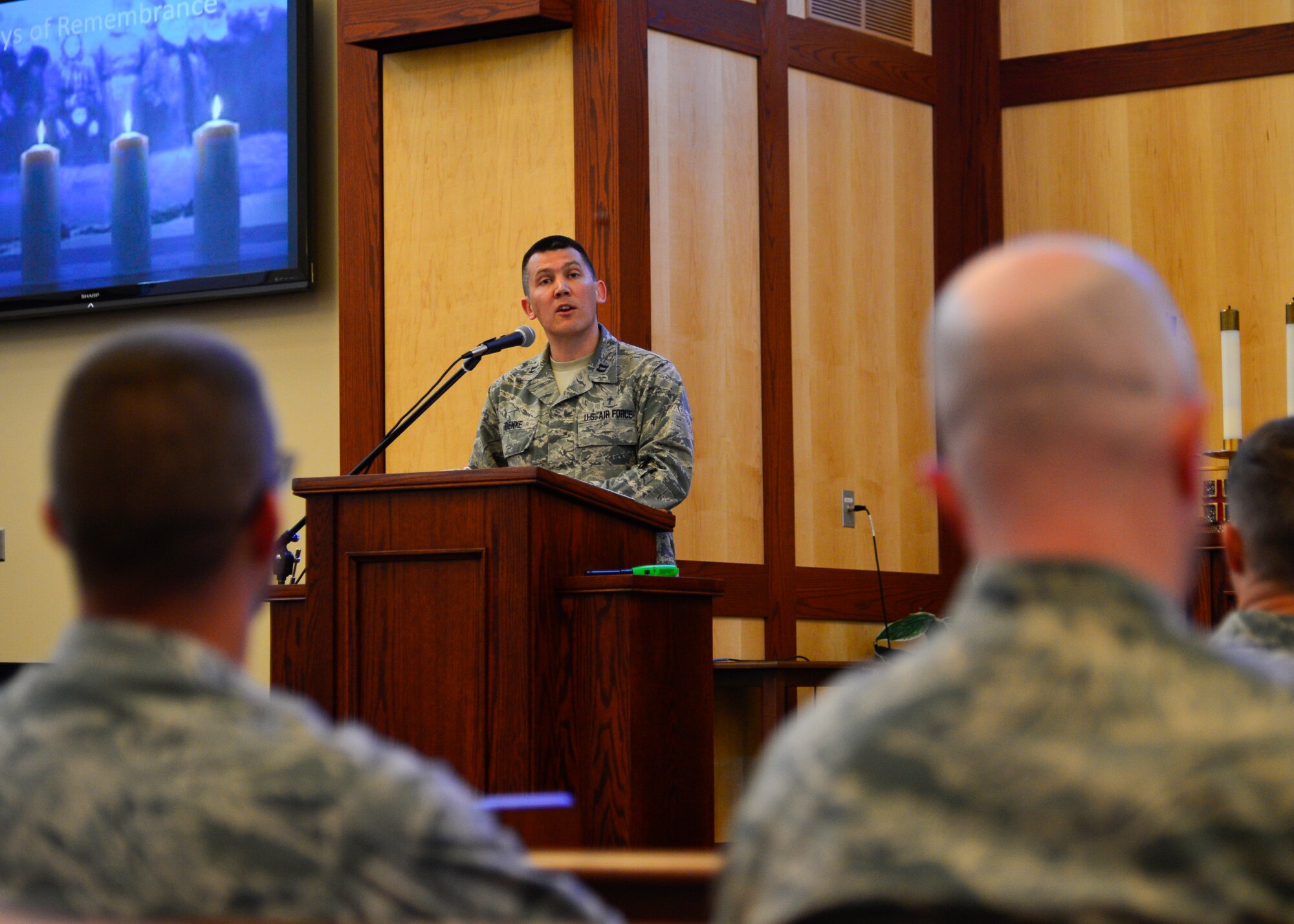 Chaplain (Capt.) Quentin Genke, 436th Airlift Wing chaplain, speaks during the Holocaust Remembrance Observance April 16, 2015, at Chapel 1 on Dover Air Force Base, Del. The special service was to honor the Holocaust Remembrance Day as part of the National Days of Remembrance. (U.S. Air Force photo/Airman 1st Class William Johnson)