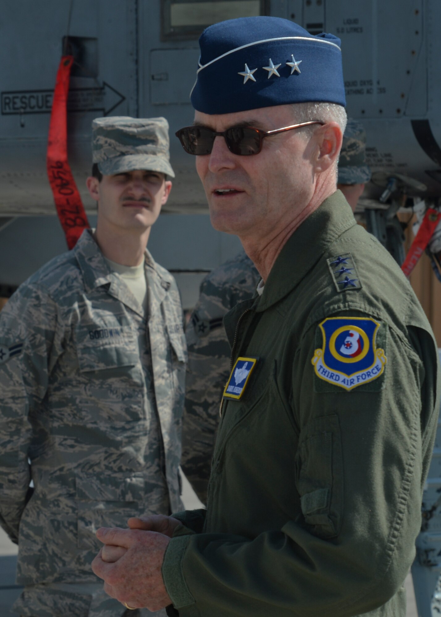 U.S. Air Force Lt. Gen. Darryl Roberson, 3rd Air Force and 17th Expeditionary Air Force commander speaks with Airmen assigned to the 354th Expeditionary Fighter Squadron during the general's visit to Campia Turzii, Romania, April 16, 2015. The general congratulated the Airmen for superior performance in their duties related to Operation Atlantic Resolve while stationed at Campia Turzii. (U.S. Air Force photo by Staff Sgt. Joe W. McFadden/Released)