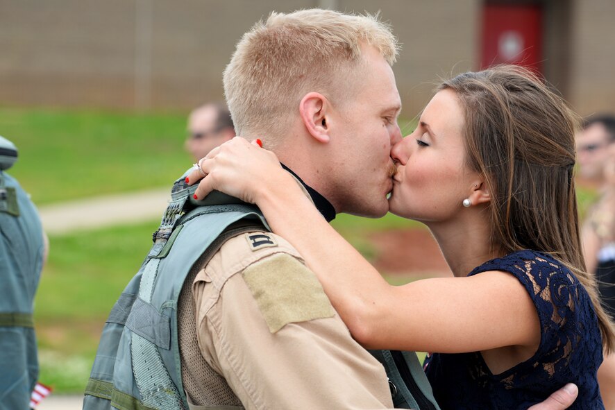 A U.S. Air Force Airman assigned to the 20th Fighter Wing returns from a deployment at Shaw Air Force Base, S.C., April 20, 2015. Approximately 200 Airmen deployed to the United States Central Command AOR for six month. (U.S. Air Force photo by Senior Airman Jonathan Bass/Released)