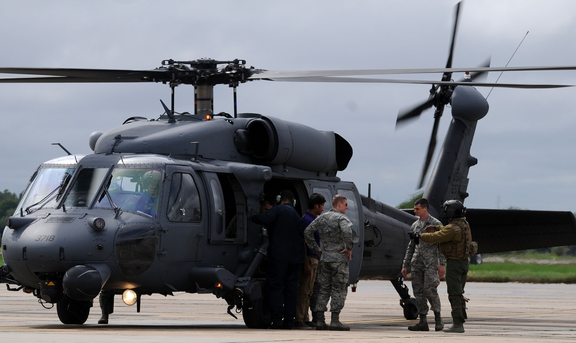 Students of the Southeast and Southwest Region Air Force ROTC Detachments receive instructions from an HH-60 Pave Hawk crew chief from the 58th Special Operations Wing, Kirtland Air Force Base, N.M., prior to boarding for an orientation flight during the “Pathways to Blue” diversity outreach event April 18, 2015, Keesler Air Force Base, Miss. Hosted by 2nd Air Force, the event provides a way to demonstrate Keesler’s and Air Education and Training Command’s technical and flight training capabilities while informing cadets about career choices available in the Air Force when deciding what path to take after college. (U.S. Air Force photo by Airman 1st Class Duncan McElroy)