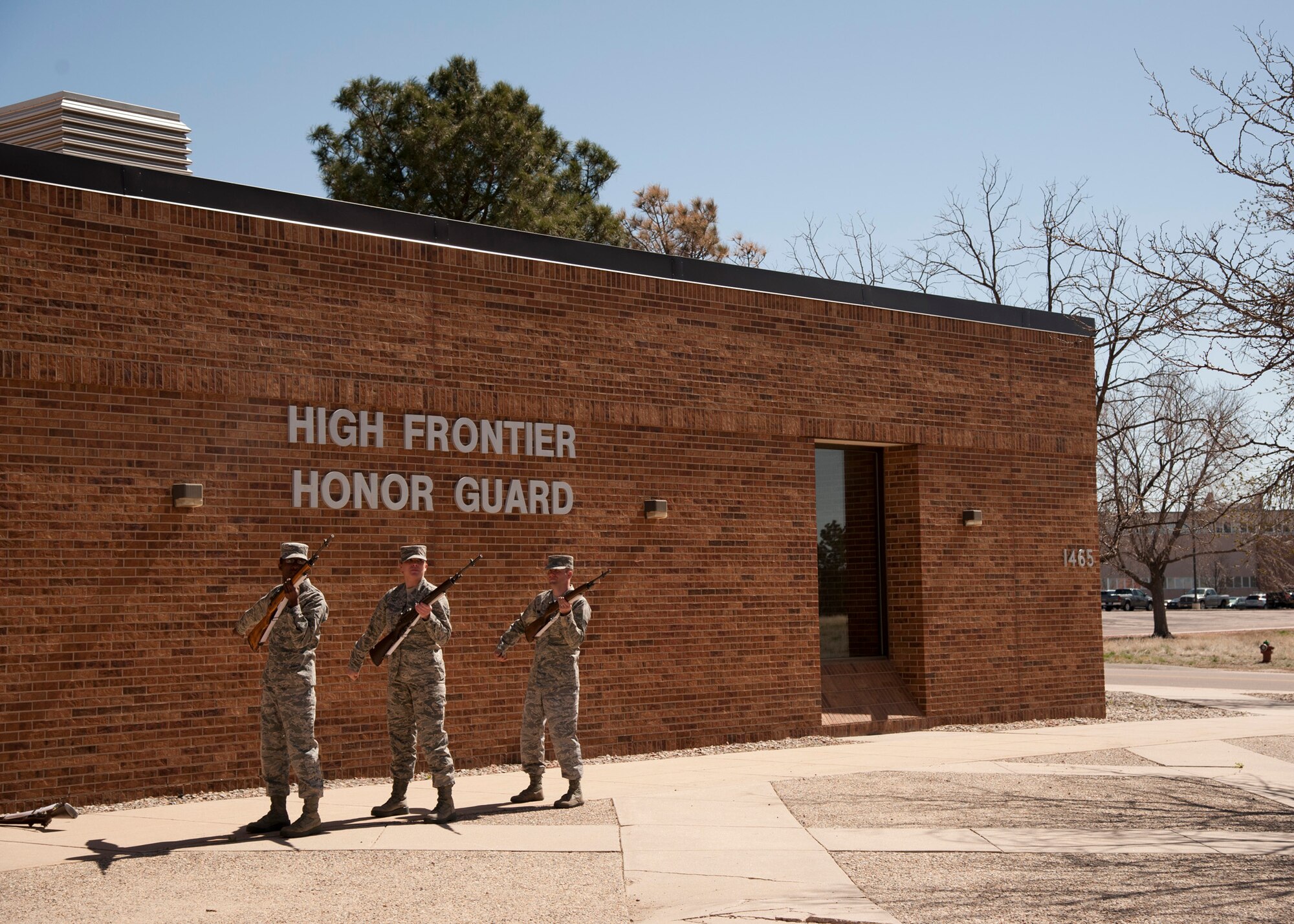 PETERSON AIR FORCE BASE, Colo. – Ceremonial guardsmen with the High Frontier Honor Guard practice uniformity with rifle firing April 8, 2015. The High Frontier Honor Guard attends various events including presenting the colors for official events, retirements and military funerals. The unit’s area of responsibility includes Colorado, Kansas, Utah and Wyoming. (U.S. Air Force photo by Senior Airman Tiffany DeNault)