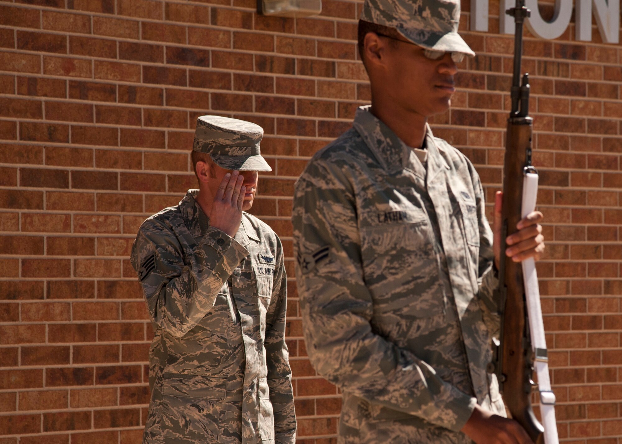 PETERSON AIR FORCE BASE, Colo. – Staff Sgt. Brandon Wunn, High Frontier Honor Guard ceremonial guardsman, salutes during a remembrance practice April 8, 2015. The High Frontier Honor Guard attends various events including presenting the colors for official events, retirements and military funerals. The unit’s area of responsibility includes Colorado, Kansas, Utah and Wyoming. (U.S. Air Force photo by Senior Airman Tiffany DeNault)