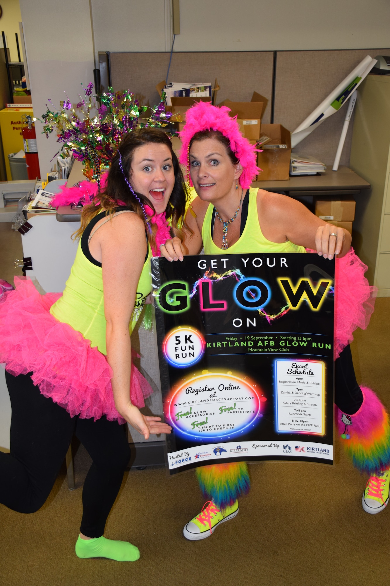Meaghan Russo, left, and Joanne Perkins of the 377th Force Support Squadron marketing program show their level of commitment to sponsored events by dressing up for a Glow Run. The program won best marketing program in the Air Force. (Courtesy photo)
