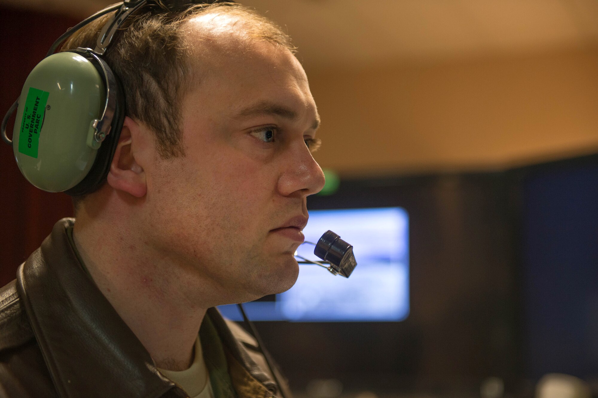 Capt. Matthew Mendenhall, a 353rd Combat Training Squadron baron controller, operates live, virtual and constructive training, April 16, 2015, in preparation for RED FLAG-Alaska 15-2 at Eielson Air Force Base, Alaska. The LVC uses software to integrate virtual cockpits, computer generated forces, live weapons platforms and real life assets fused together to produce a battlefield for training. (U.S. Air Force photo by Staff Sgt. Shawn Nickel/Released) 