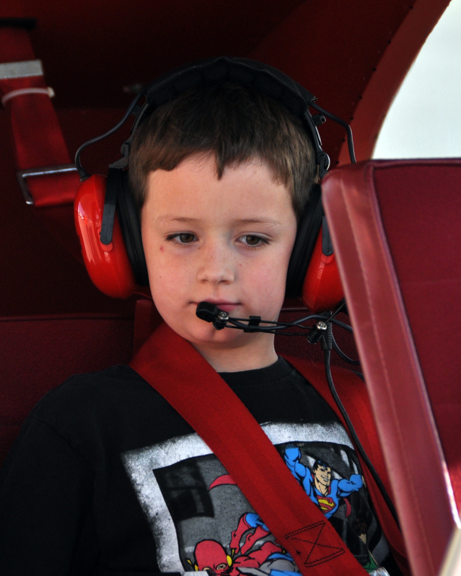 A future aviator checks his headset and microphone in preparation to fly with the Experimental Aircraft Association’s Local Chapter 343 Young Eagles program at the Shreveport Downtown Airport in Louisiana on April 11, 2015. The Experimental Aircraft Association includes members that are active duty and reservists assigned to near-by Barksdale Air Force Base. Their Young Eagles program gives young people, ages 8-17, interested in general aviation an opportunity learn about flight planning, flight safety and the basics of flying an general aviation aircraft. (U.S. Air Force photo by Master Sgt. Laura Siebert/Released)