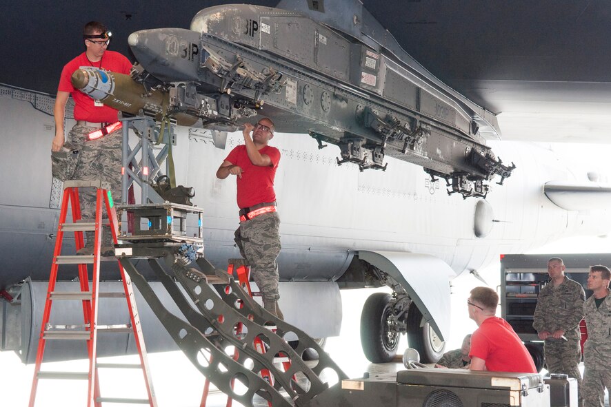 A team from the 96th Aircraft Maintenance Unit competed for the title of the 2nd Aircraft Maintenance Squadron Weapons Load Crew of the Quarter on April 10, 2015 on Barksdale Air Force Base, La. The competition included a dress and appearance inspection, a written test, an inspection of tools and equipment, along with the timed weapons loading technical operation. (U.S. Air Force photo by Master Sgt. Dachelle Melville/Released)
