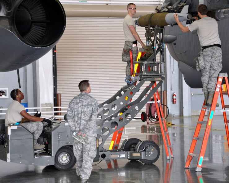A team from the 20th Aircraft Maintenance Unit competed for the title of the 2nd Aircraft Maintenance Squadron Weapons Load Crew of the Quarter on April 10, 2015 on Barksdale Air Force Base, La. The competition included a dress and appearance inspection, a written test, an inspection of tools and equipment, along with the timed weapons loading technical operation. (U.S. Air Force photo by Master Sgt. Laura Siebert/Released)