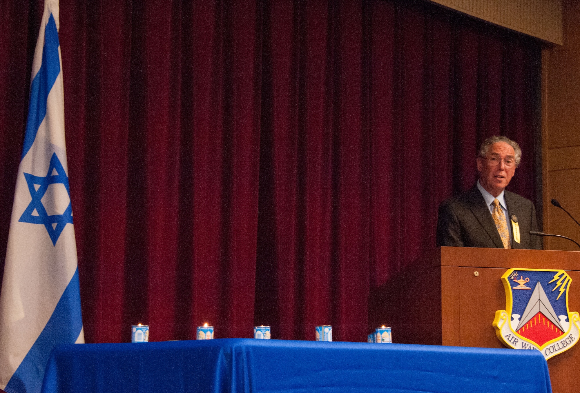 Rabbi Elliot Stevens, Temple Beth Or spiritual leader and guest speaker, addresses the audience during the annual Holocaust Days of Remembrance Commemoration ceremony, April 14, 2015, Maxwell Air Force Base, Alabama. (U.S. Air Force photo by Henry Hancock/Cleared)
