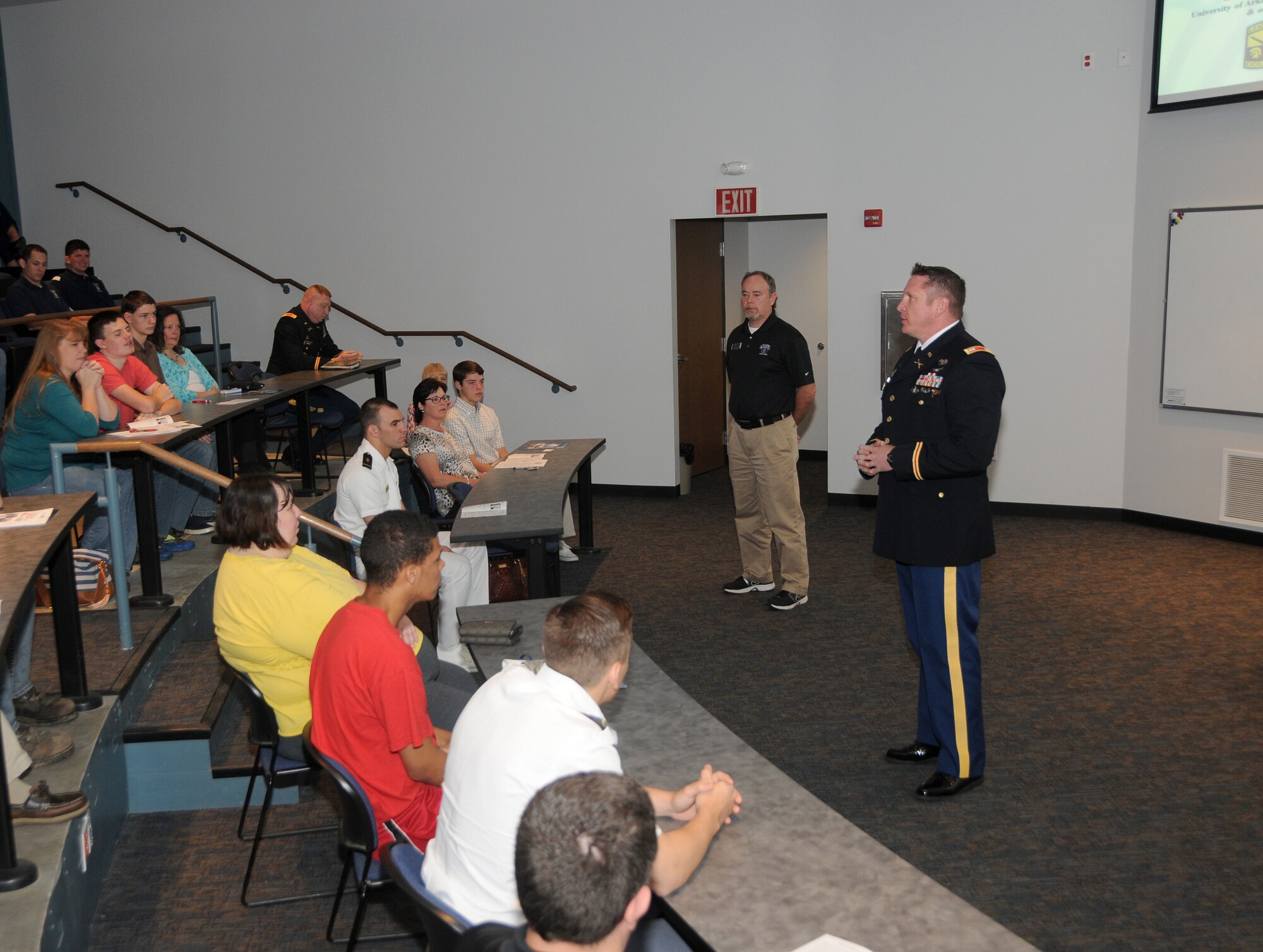 U.S. Army Capt. Eric Ashmore, a military science instructor at the University of Central Arkansas’ Reserve Officers Training Corps, speaks during Academy day with Arkansas youth interested in attending a military academy at Ebbing Air National Guard Base, Fort Smith, Ark., April 11, 2015. (U.S. Air National Guard photo by Senior Airman Cody Martin/released)