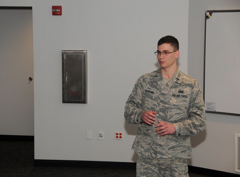 U.S. Air Force 1st Lt. Clayton Sharum speaks to Arkansas youth April 11, 2015 during Academy day held at Ebbing Air National Guard Base, Fort Smith, Ark. Youth interested in attending a service academy from around Arkansas attended an information session to learn about the unique aspects of each service branch’s academy.  Sharum represented the University of Arkansas Reserve Officers Training Corps program. (U.S. Air National Guard photo by Senior Airman Cody Martin/released)