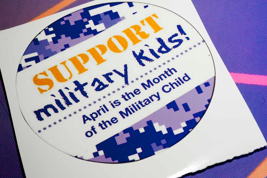 A sticker rests on a table on Minot Air Force Base, N.D., April 15, 2015. A celebration was hosted at Rough Rider Lanes to show appreciation toward military children. (U.S. Air Force photo/Airman 1st Class Sahara L. Fales)