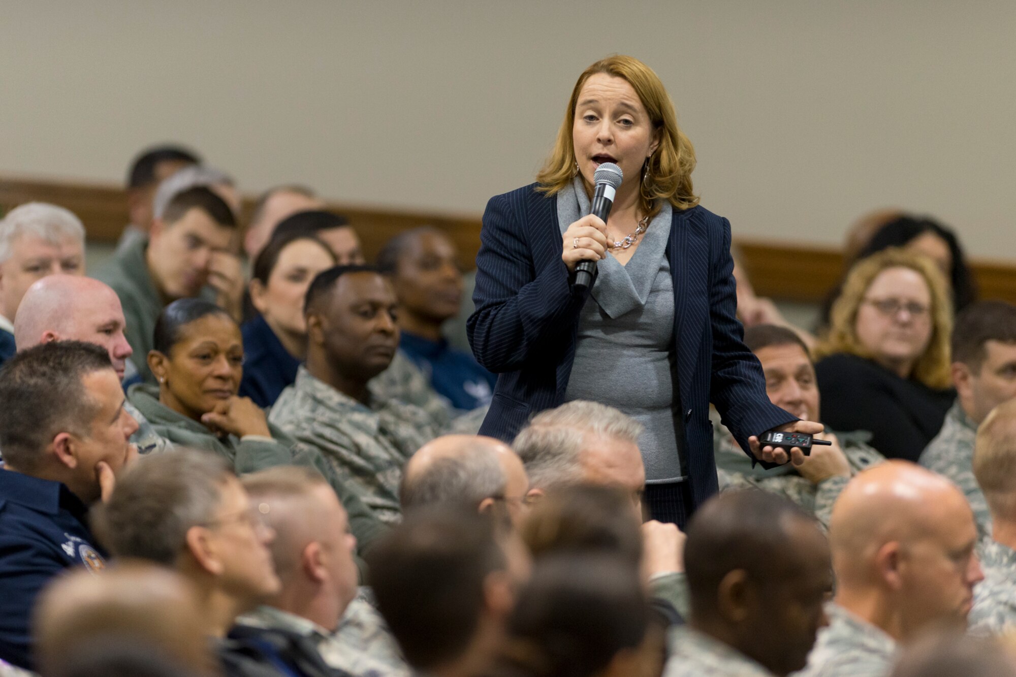 Andrea Verdino, Joint Base Andrews Sexual Assault Response Coordinator, addresses Airmen at the base theater at Joint Base Andrews, Md., April 9, 2015. The Airmen gathered to kick off the start of Sexual Assault Awareness and Prevention Month. (Air National Guard photo by Master Sgt. Marvin R. Preston/RELEASED)