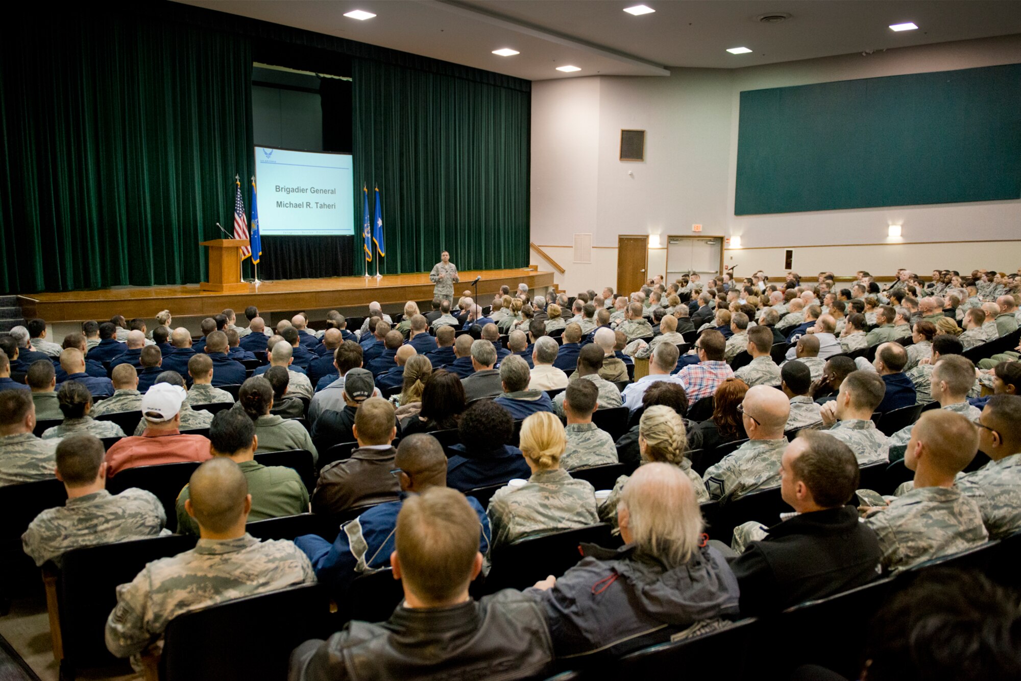 Brig. Gen. Michael R. Taheri, commander of the Air National Guard Readiness Center addresses Airmen at the base theater at Joint Base Andrews, Md., April 9, 2015. Airmen gathered to discuss awareness, prevention and ways to care for victims of sexual assault. (Air National Guard photo by Master Sgt. Marvin R. Preston/RELEASED)